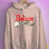 Believe Queer Pride Flag Jingle Bell Hoodie - Light Pink