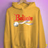 Believe Twink Pride Flag Jingle Bell Hoodie - Mustard