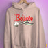 Believe Agender Pride Jingle Bell Hoodie - Light Pink